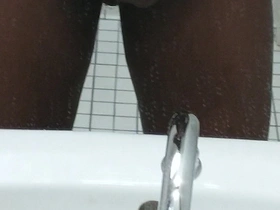 Handjob in bathroom
