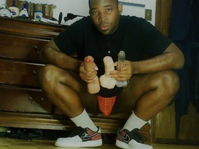 College jock stretches out gluts before basketball practice